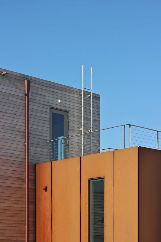 QUARTER design studio + EngineHouse | Seaside Residence | Block Island, RI – corten steel cladding and natural cedar siding, with stainless railings (photo provided by EngineHouse)