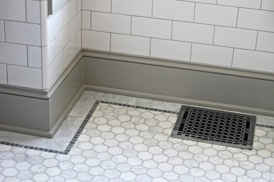 QUARTER design studio | Victorian Bathroom | Melrose, MA – detailed marble floor, grey baseboard trim, and classic subway tile